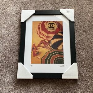 Fairchild Paris Vintage Chanel Beach Umbrella Framed Print
